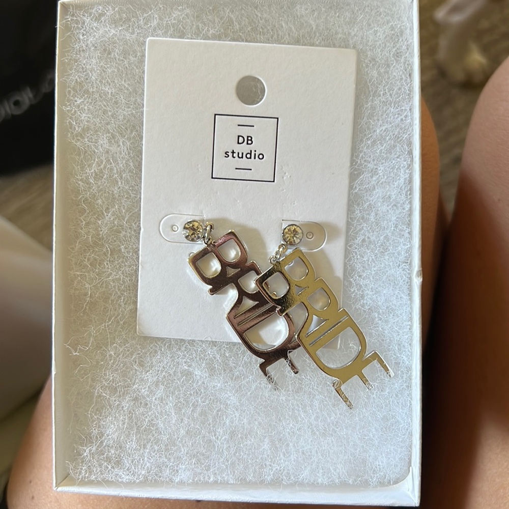 Never worn silver BRIDE earrings